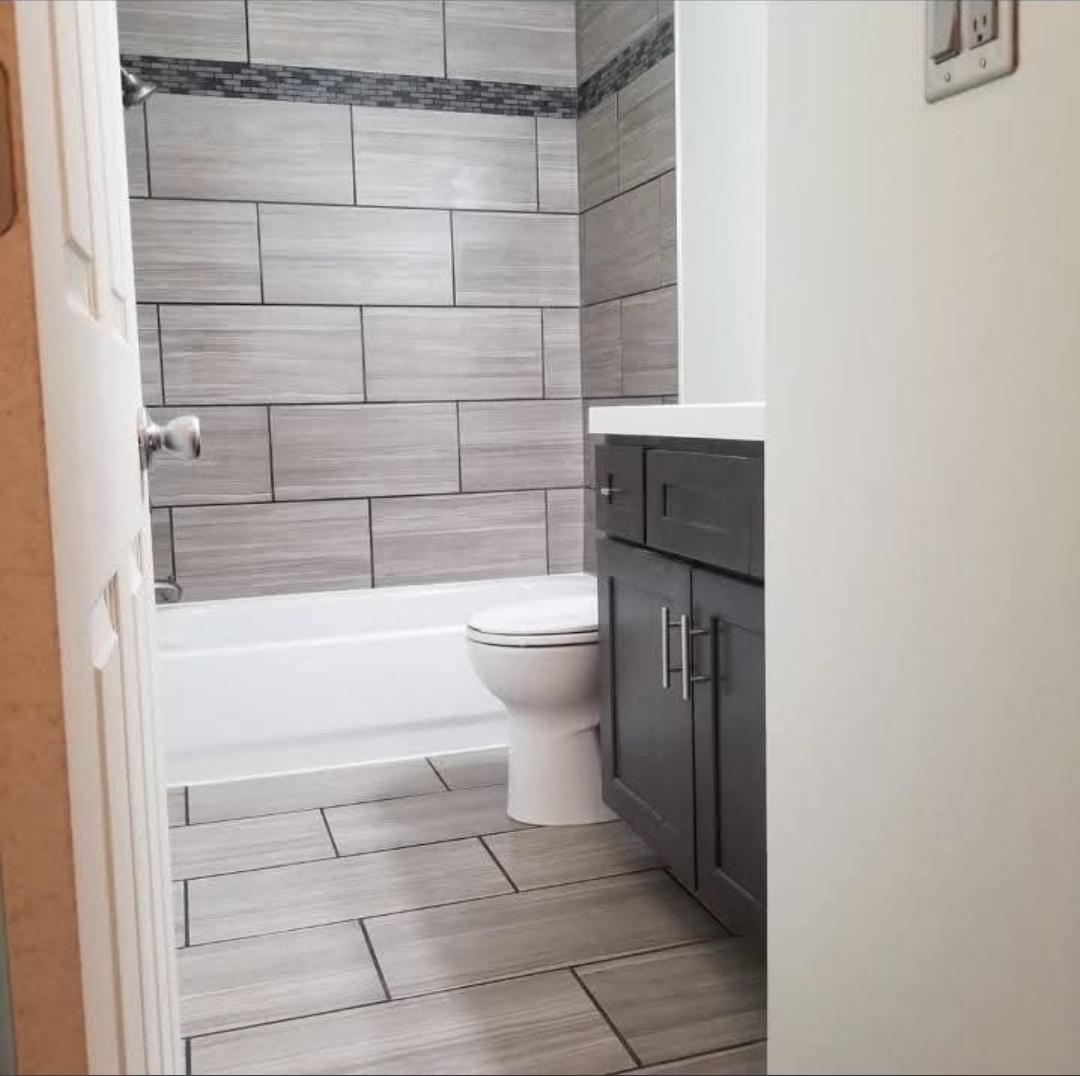 Bathroom tile work by Ravencraft