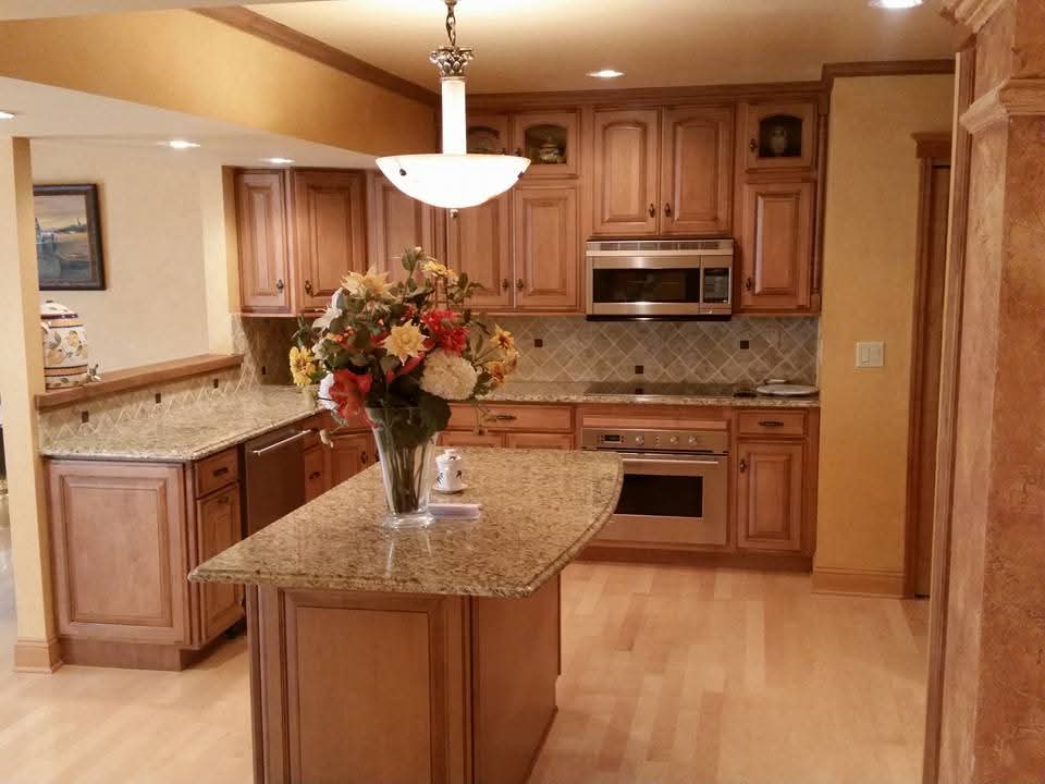 Custom kitchen remodel with granite island and countertops