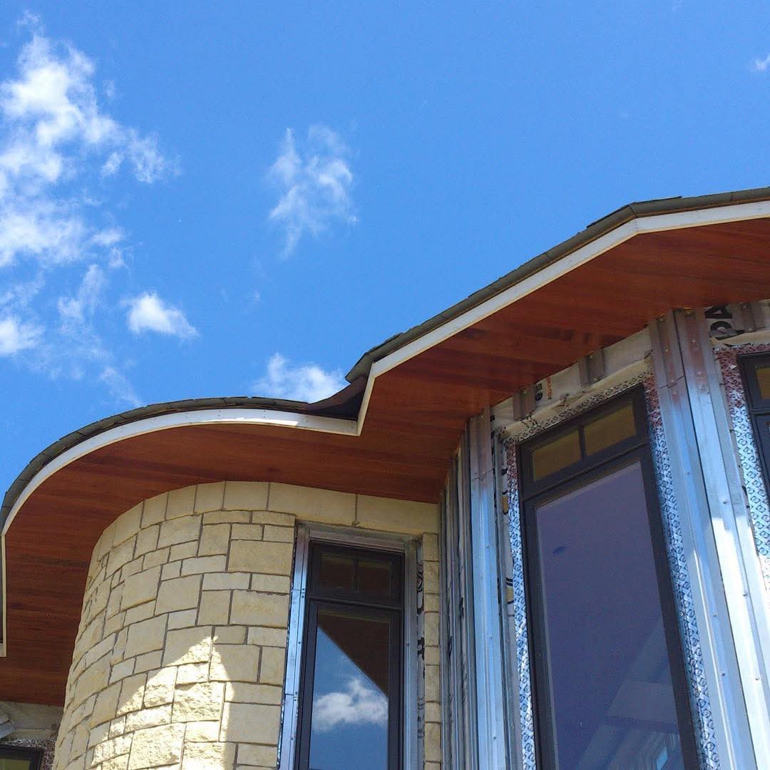 Mahogany soffit and window trim on new construction